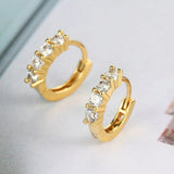 Boucles d'oreilles créoles rondes en or brillant intemporelles
