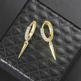 Boucles d'oreilles pendantes en cristal étincelant doré et motif à pointes