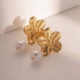 Boucles d'oreilles pendantes fleurs plaquées or nacrées