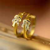Boucles d'oreilles vintage en cristal avec nœud doré