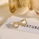 Boucles d'oreilles vintage en or avec perle carrée et opale