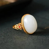 Bague ovale creuse vintage en or blanc avec jade