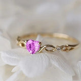 Bague vintage en or et rose en forme de cœur avec pierre précieuse
