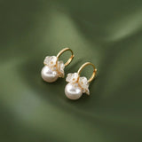 Boucles d'oreilles pendantes vintage avec perle et fleur