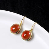 Boucles d'oreilles vintage en or et rubis ovale rouge