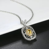 Collier rétro en argent avec pierres précieuses jaunes et cristaux