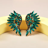 Boucles d'oreilles vintage en or et cristal bleu sarcelle