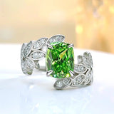 Bague en argent avec motif feuille en cristal vert