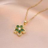 Collier vintage avec pendentif fleur vert doré