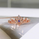 Bague princesse couronne en or rose et cristal violet