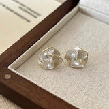 Boucles d'oreilles vintage à fleur blanche