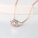 Collier vintage avec pendentif cercle en cristal et or rose