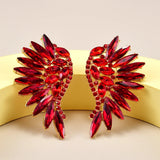 Boucles d'oreilles vintage en or avec pierres précieuses rouges ailées