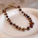 Collier vintage avec pierre œil-de-tigre marron