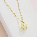Collier pendentif cube vintage en cristal transparent doré