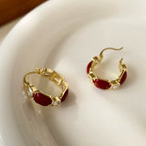 Boucles d'oreilles vintage en or et pierre rouge