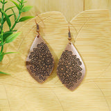 Boucles d'oreilles vintage en cuivre gravé mandala