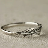 Bague vintage en argent avec plume