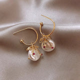Boucles d'oreilles vintage en or et perles cerise