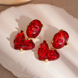 Boucles d'oreilles pendantes vintage en verre rouge en forme de cœur
