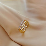 Bague ajustable à double bande en or et cristal