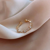 Bague ajustable classique ronde en or et cristal
