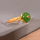 Bague vintage en or vert avec pierre précieuse et ajustable, de forme carrée unique