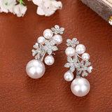 Boucles d'oreilles vintage en argent avec perles florales