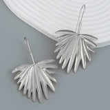 Boucles d'oreilles vintage en argent avec feuilles tropicales