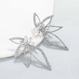 Boucles d'oreilles papillon en cristal et strass argentés scintillants