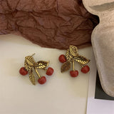 Boucles d'oreilles classiques en or rouge cerise