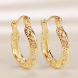 Boucles d'oreilles vintage en or avec motif gravé