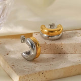 Boucles d'oreilles vintage en or et argent incurvées