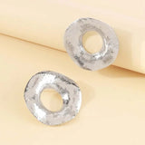 Boucles d'oreilles sculpturales uniques en argent à cercles ouverts