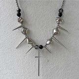Collier vintage avec pendentif croix à pointes en argent