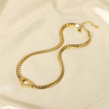 Collier vintage en or avec fermoir en forme de cœur