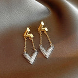 Boucles d'oreilles pendantes en cristal en forme de V en or et argent