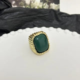 Bague ajustable vintage en or avec pierre verte texturée