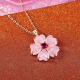 Collier pendentif fleur rose doré