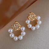 Boucles d'oreilles vintage en or et perles roses