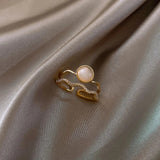 Bague ajustable vintage en or et perle blanche