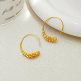 Boucles d'oreilles créoles en or en forme de feuille de blé