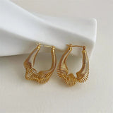 Boucles d'oreilles créoles classiques en spirale dorée, forme incurvée unique