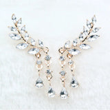 Boucles d'oreilles pendantes en cristal doré avec feuilles et pompons