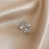 Bague ajustable argentée à mailles scintillantes