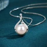 Collier vintage en argent avec perle en forme de larme