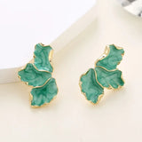 Boucles d'oreilles vintage en or et feuilles vertes