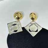 Boucles d'oreilles classiques en or et argent de forme carrée unique
