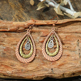 Boucles d'oreilles pendantes vintage en spirale