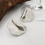 Boucles d'oreilles vintage en argent avec volants plissés